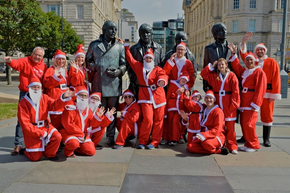 City Santas take Ferry across the Mersey to mark countdown to Liverpool Santa Dash