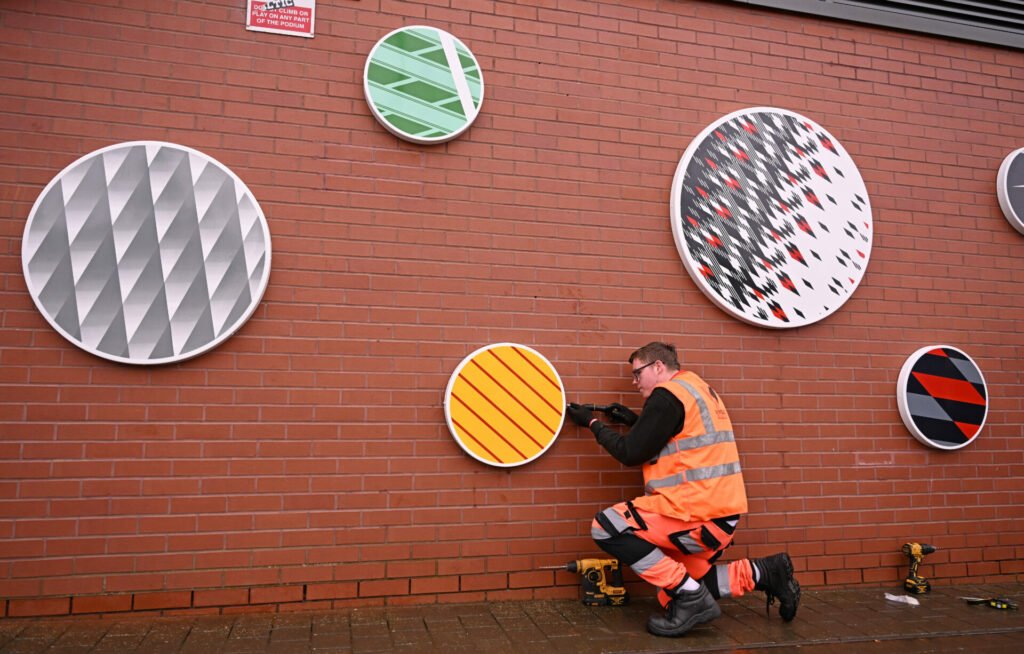 LFC retro kits inspire new artwork unveiled at Anfield