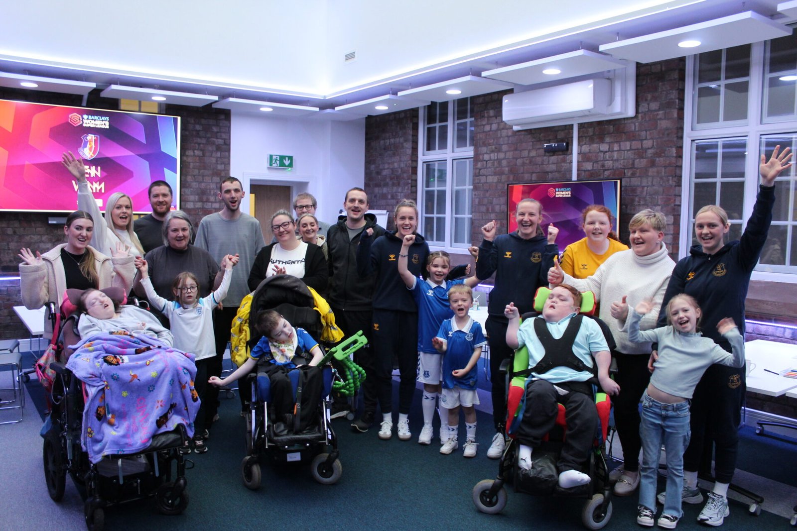 Everton FC Women squad visit Claire House Liverpool