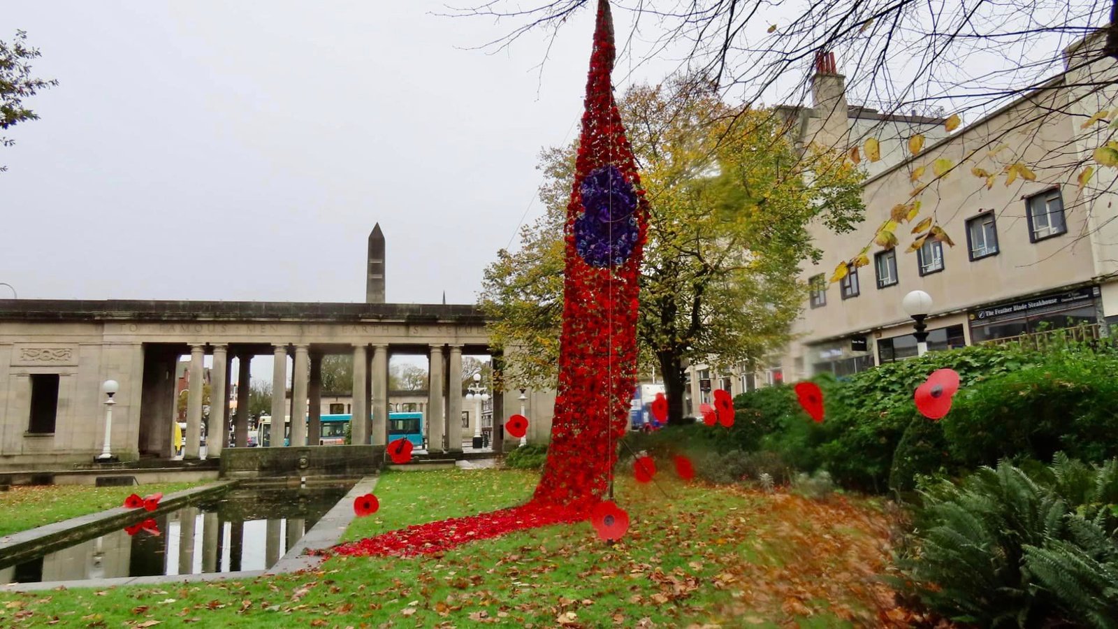 Stunning Poppy Drape created with 10,000 crochet poppies unveiled in Southport Remembrance Gardens