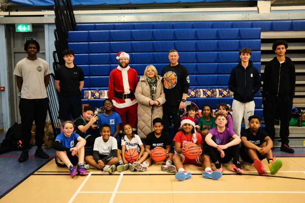 M&S Bank Arena Staff donate Christmas party fund to bring joy to Toxteth