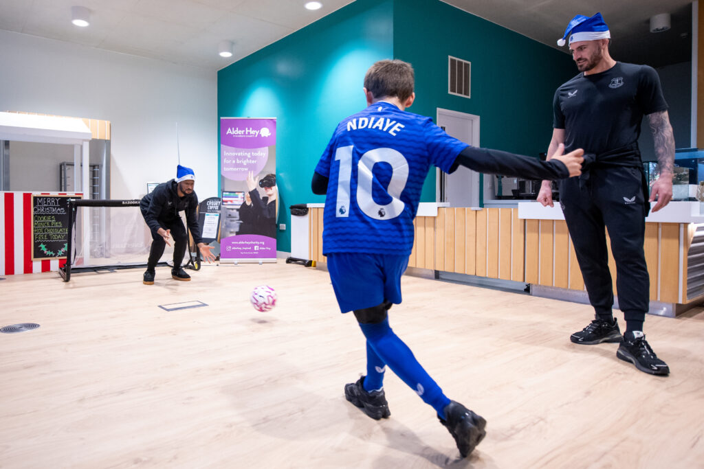 Everton Squad Spreads Festive Joy on Annual Alder Hey Christmas Visit