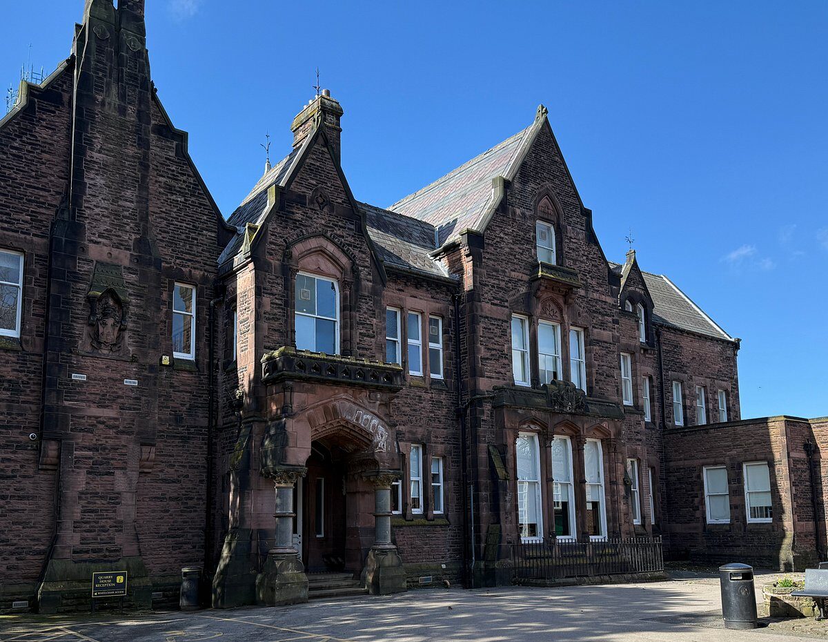 Step inside John Lennon’s former Liverpool school on a unique Beatles tour