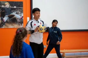 Liverpool FC stars Wataru Endo and Giovanni Leoni surprise Knowsley primary school pupils